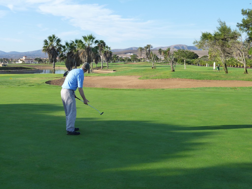 man golfing